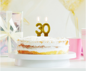 Candle on the 30th birthday cake, number "30"