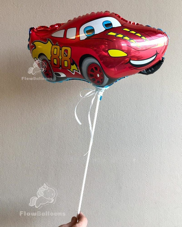 The foil balloon - smiling car Cars, zigzag on the stick 37 cm