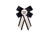 60th Birthday Corsage – Cream and Black